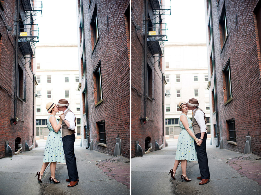 engaged couple share a kiss in a Seattle Alley