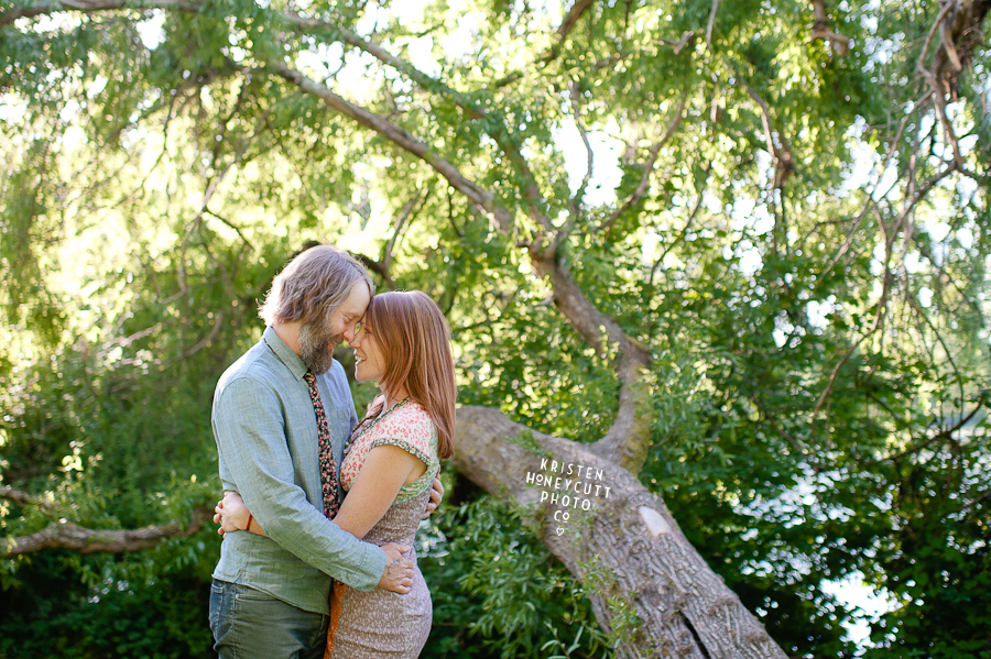 backlit couple in seattle's sunny arboretum for a spring summer engagement session