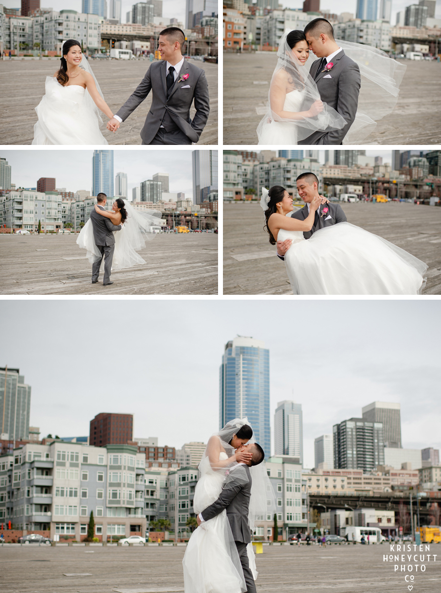Bride and groom run along Seattle pier with the great wheel and skyline for wedding portraits