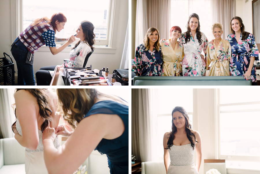 Bride getting ready with bridesmaids in matching robes