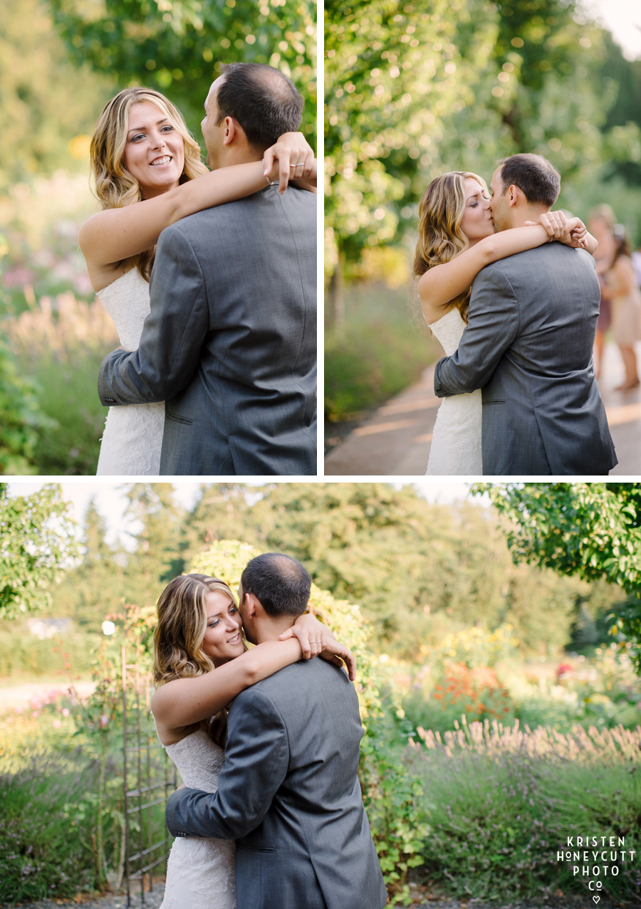 Newly weds share a first dance outside on the patio surrounded by flowers at Farm Kitchen wedding reception.