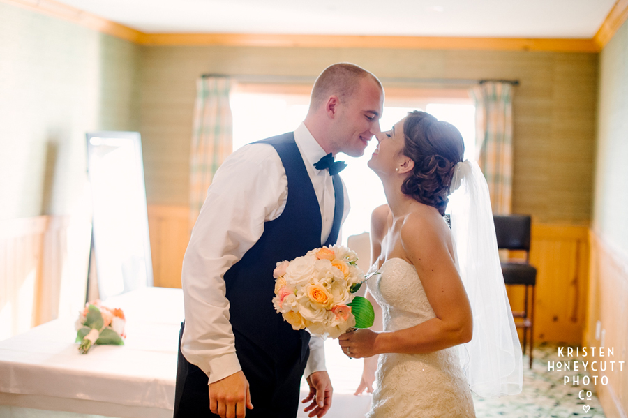Bride and groom share a kiss after the ceremony at the Edgewater Hotel Seattle