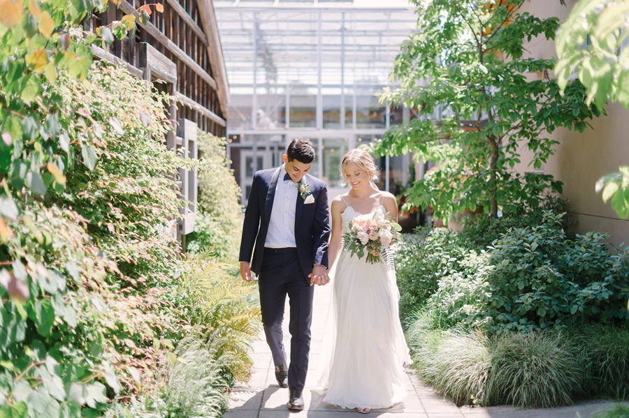 Bohemian bride with garden bouquet and groom at UW Center for Urban Horticulture on their wedding day.