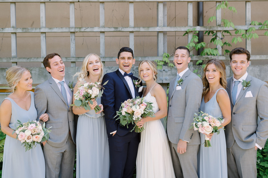 Grey and blue bridal party at Seattle garden wedding.
